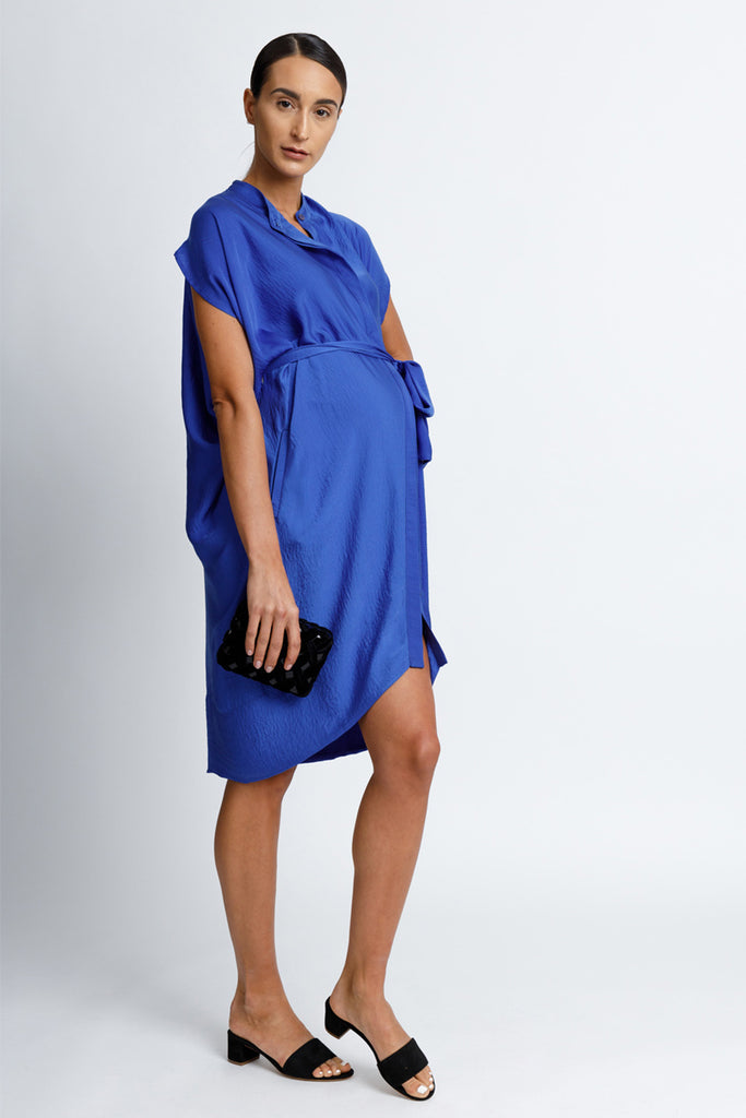 FORMERLY YAN Maternity Figure Flattering Button Down Shirt Dress with Cap Sleeves and Self Tie. Knee Length. Cobalt. Adjustable to Wear During and After Pregnancy. Nursing Friendly